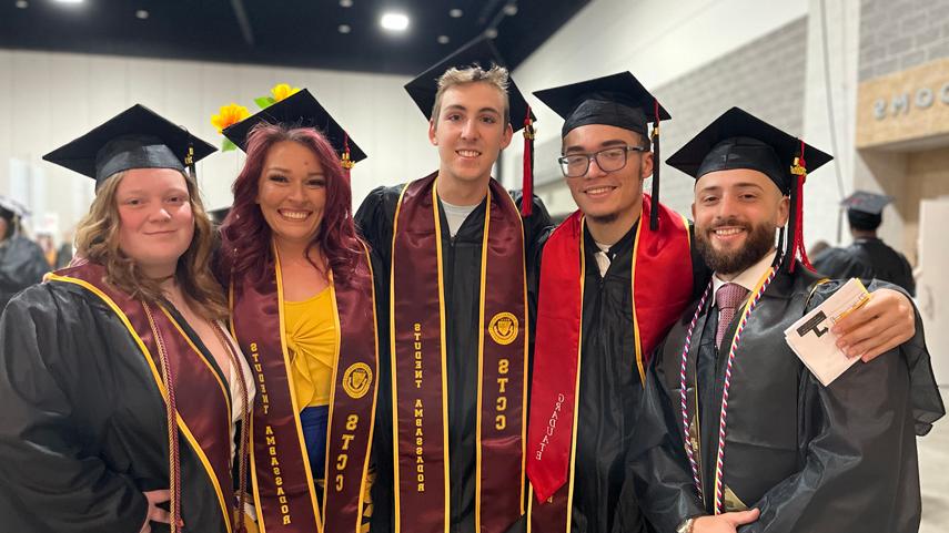 student leaders in graduation caps and gowns at the 2024 commencement